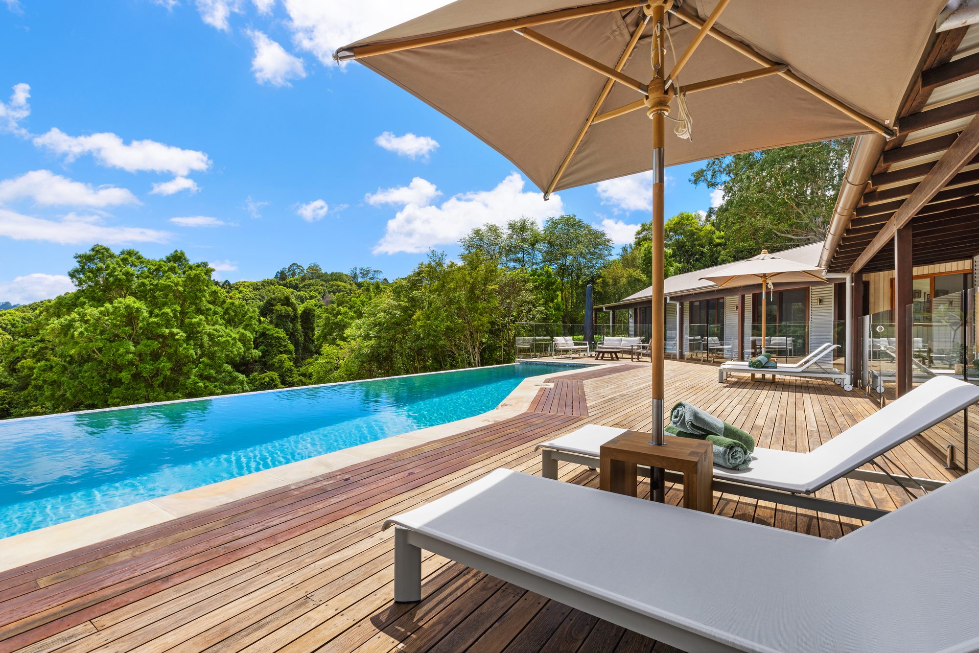 Infinity pool and deck overlooking the rainforest
